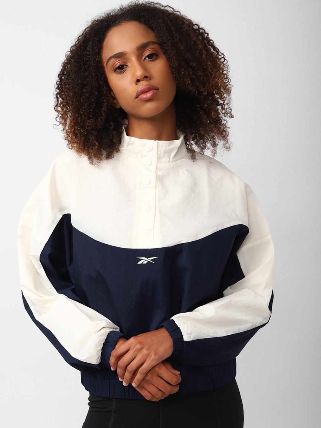 

Reebok Women Colourblocked Polyester Bomber Jacket, Navy blue