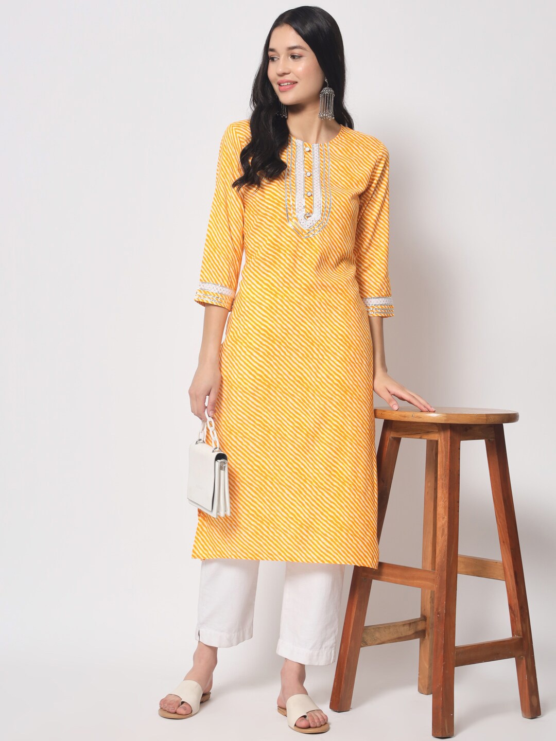 

Vastralay Striped Round Neck Straight Regular Kurta, Yellow