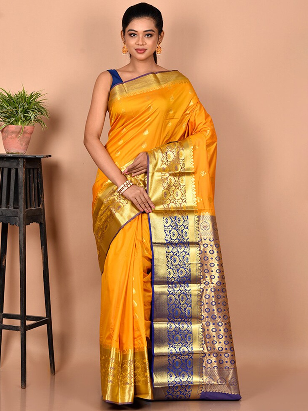 

AllSilks Yellow & Blue Woven Design Zari Silk Blend Kanjeevaram Saree