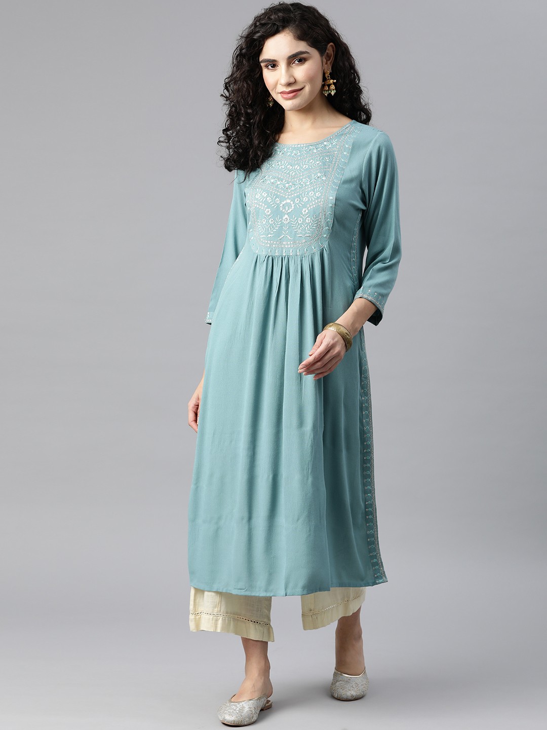 

Readiprint Fashions Women Teal Floral Yoke Design Kurta
