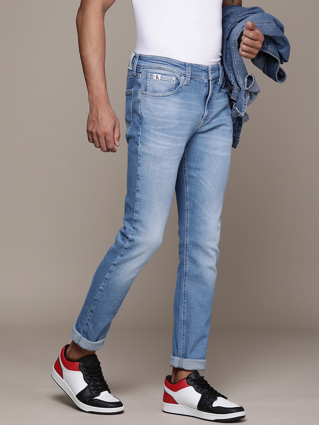 

Calvin Klein Jeans Men Skinny Fit Heavy Fade Stretchable Mid-Rise Jeans, Blue