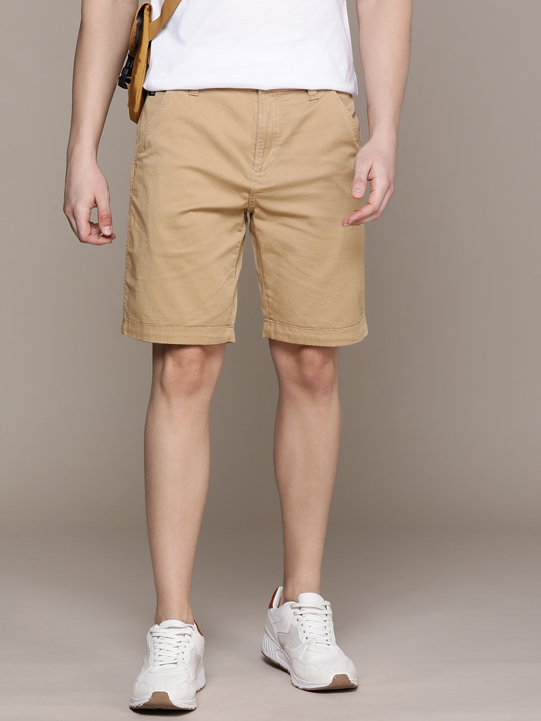 

Calvin Klein Jeans Men Solid Mid-Rise Chino Shorts, Beige