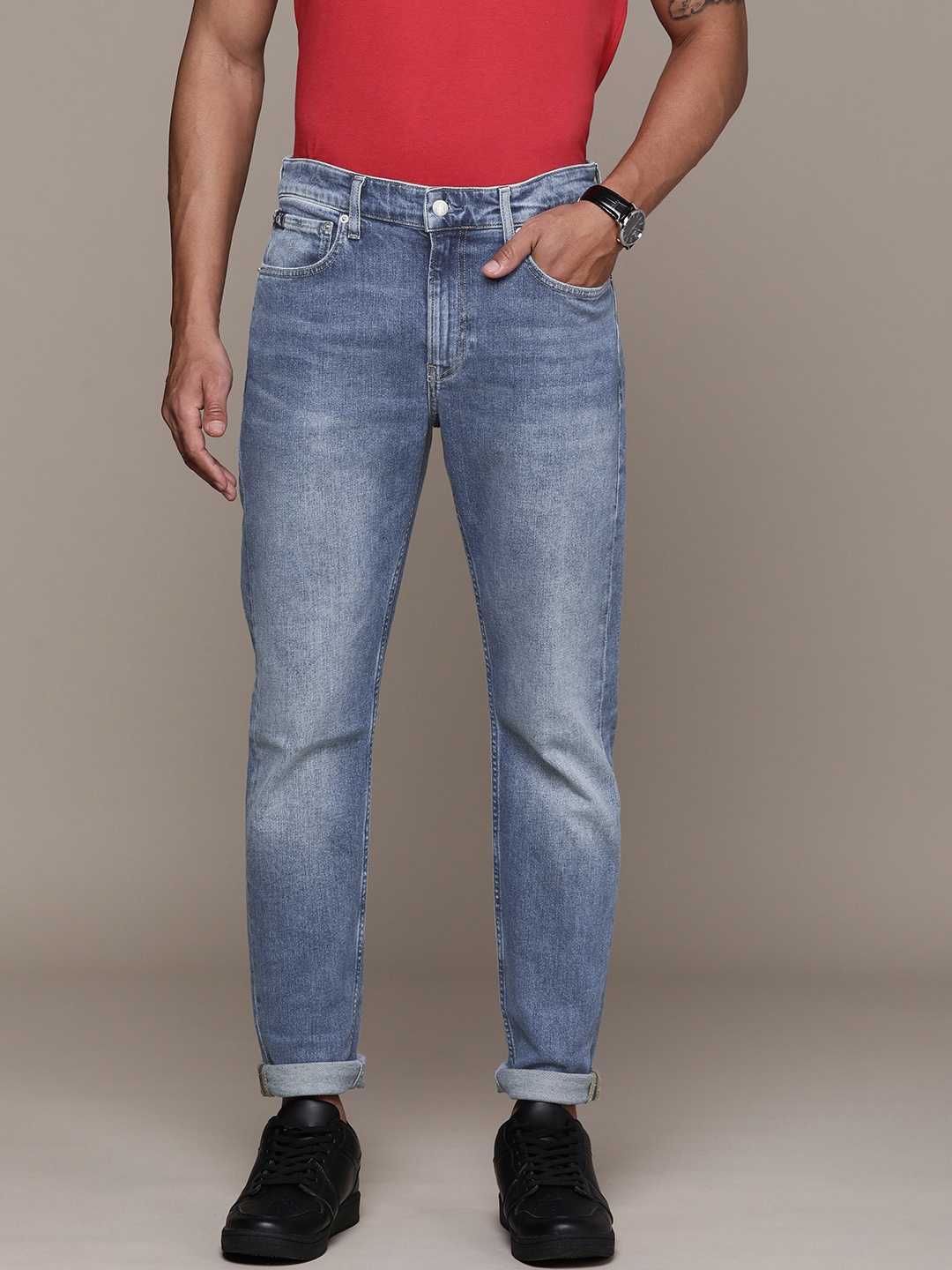 

Calvin Klein Jeans Men Slim Fit Light Fade Stretchable Mid-Rise Jeans, Blue