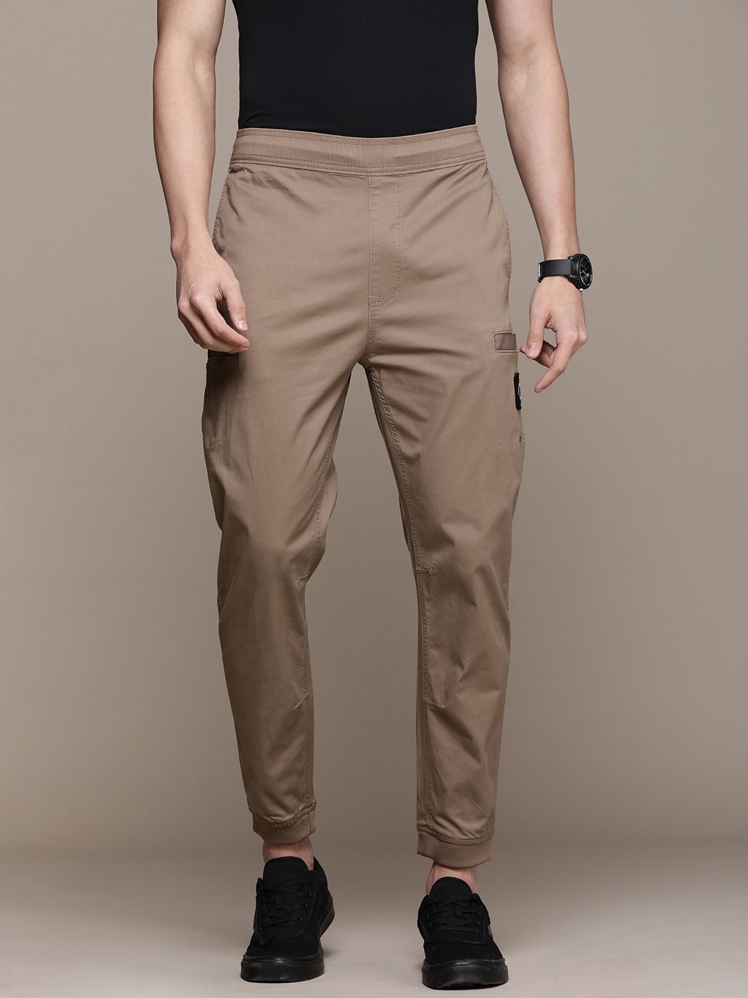 

Calvin Klein Jeans Men Slim Fit Joggers, Brown