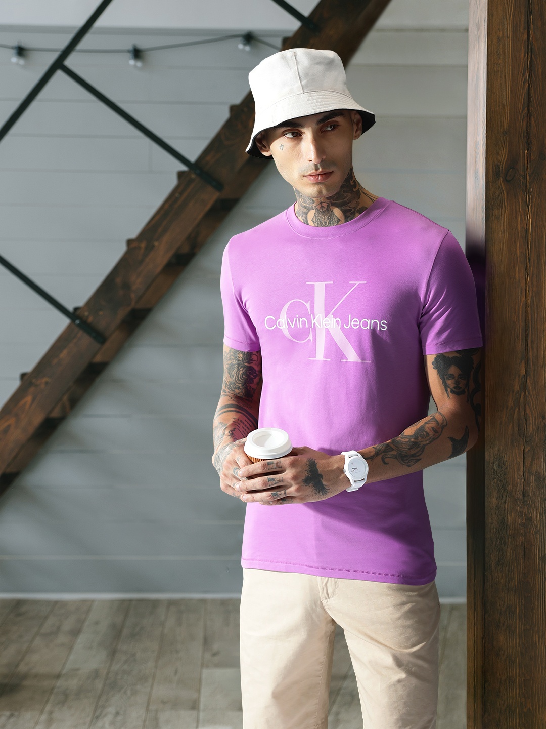 

Calvin Klein Jeans Men Brand Logo Printed Pure Cotton Slim Fit T-shirt, Purple