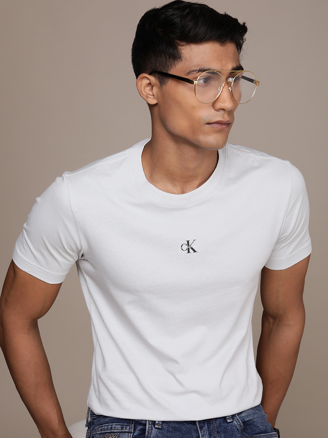 

Calvin Klein Jeans Men Solid Pure Cotton T-shirt, Grey