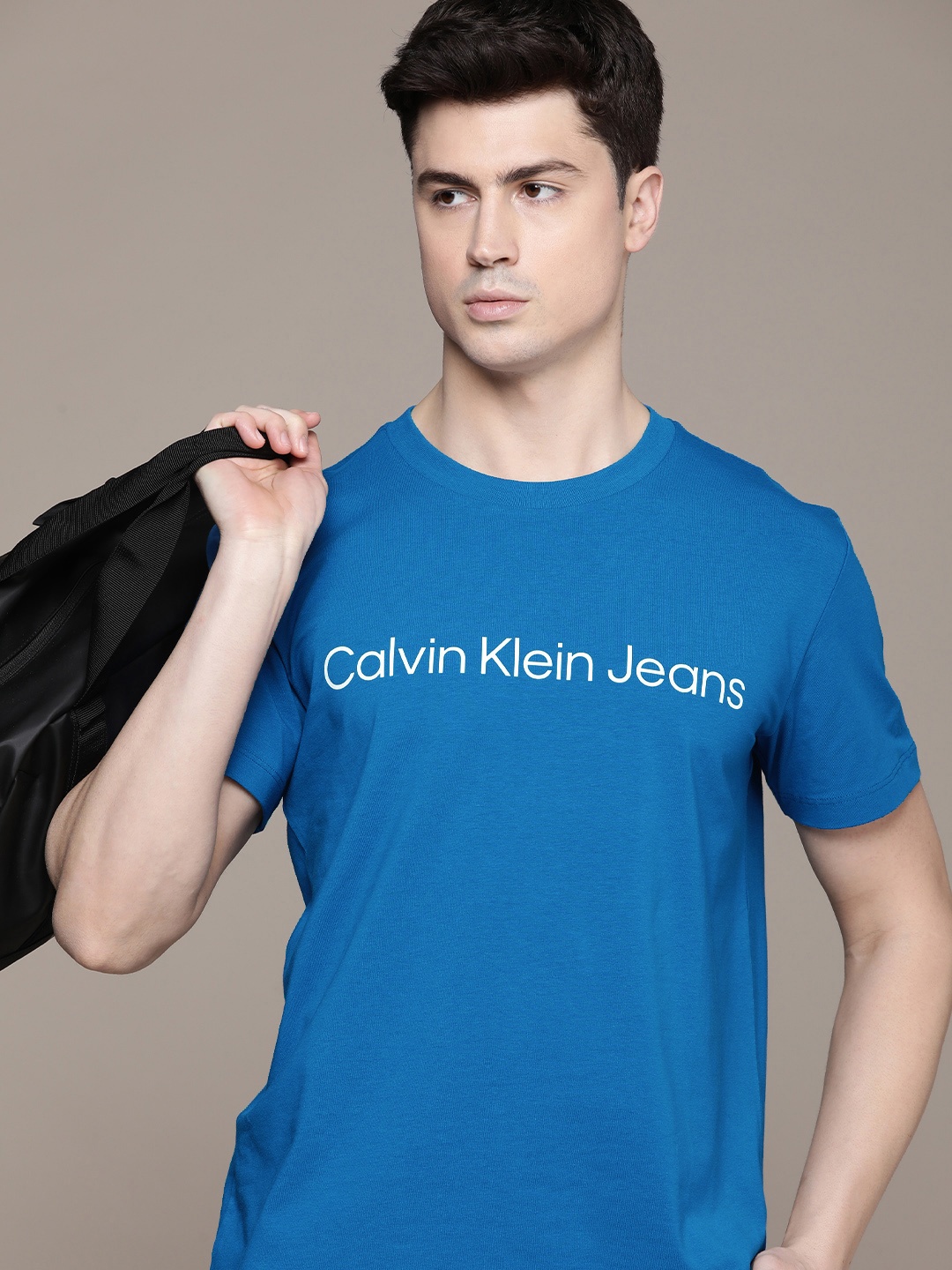 

Calvin Klein Jeans Brand Logo Print Round Neck Knitted T-shirt, Blue