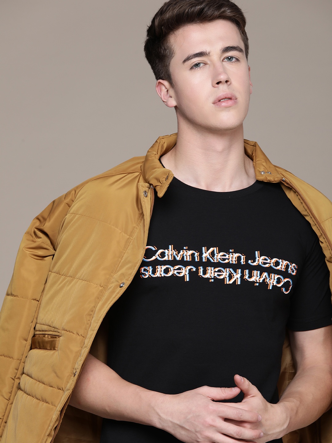 

Calvin Klein Jeans Brand Logo Print Monochrome Knitted Slim Fit T-shirt, Black
