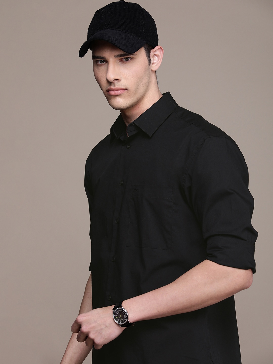 

Calvin Klein Jeans Men Solid Relaxed Fit Spread Collar Casual Shirt, Black