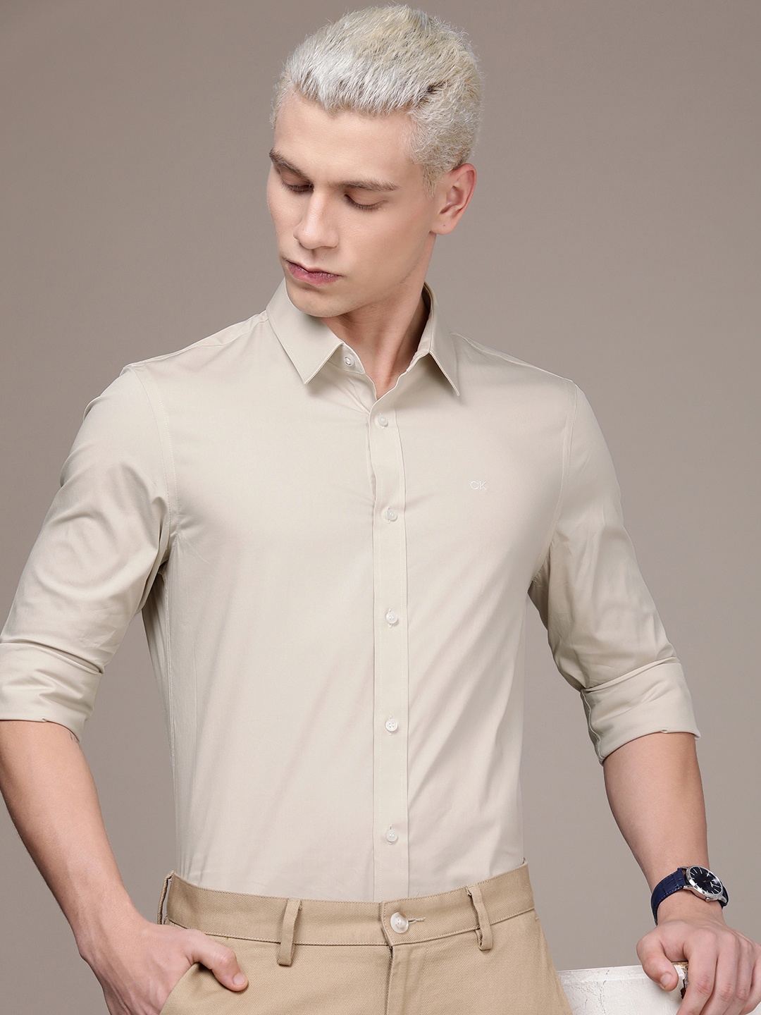 

Calvin Klein Jeans Men Solid Spread Collar Slim Fit Casual Shirt, Beige