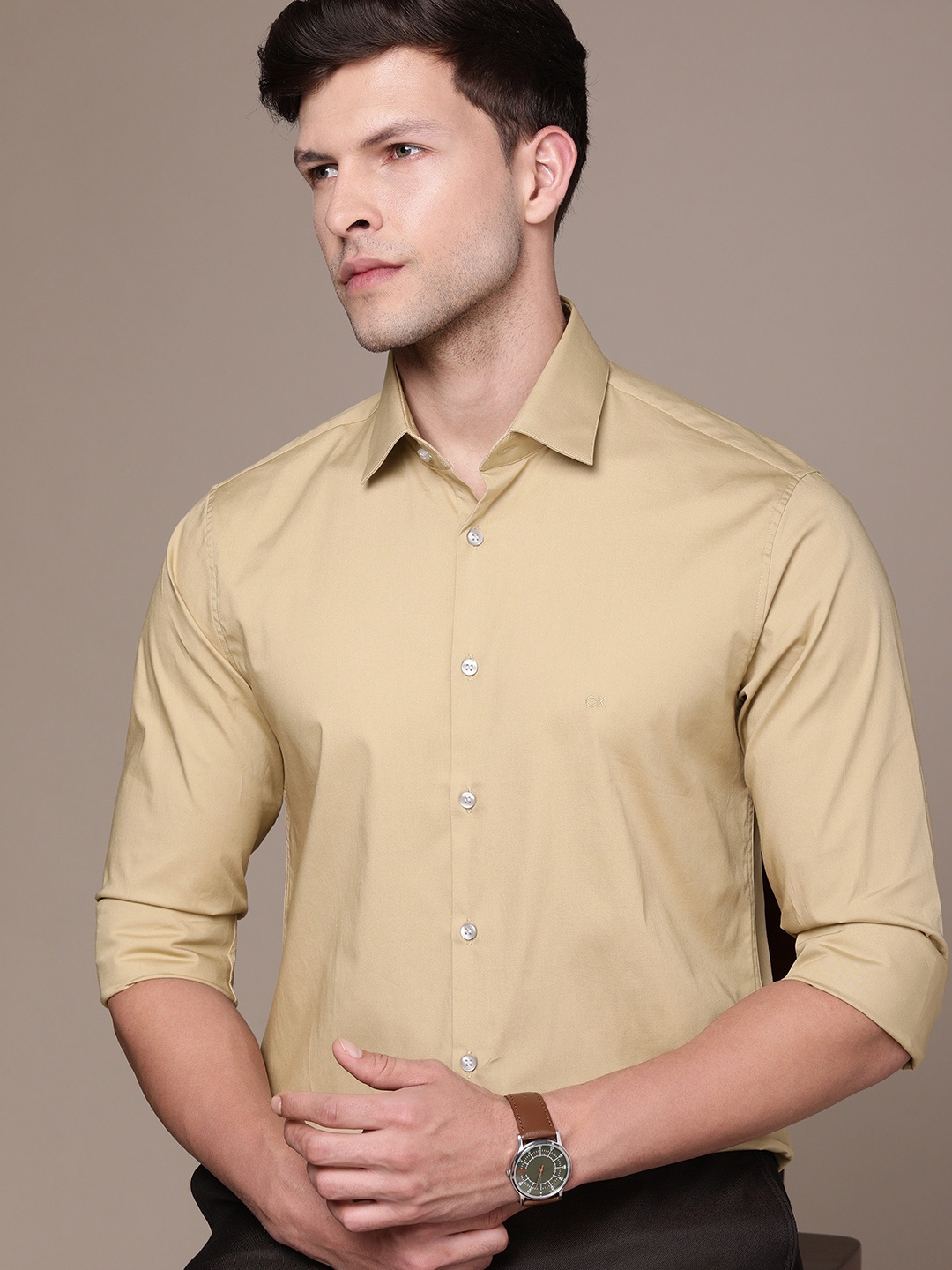 

Calvin Klein Jeans Men Solid Slim Fit Casual Shirt, Beige