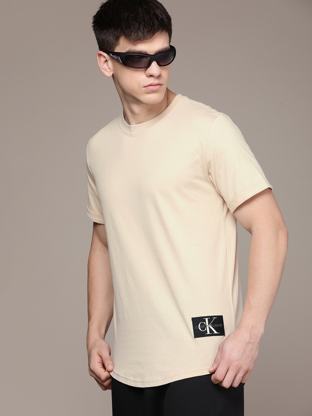 

Calvin Klein Jeans Men Pure Cotton T-shirt With Applique Detail, Beige