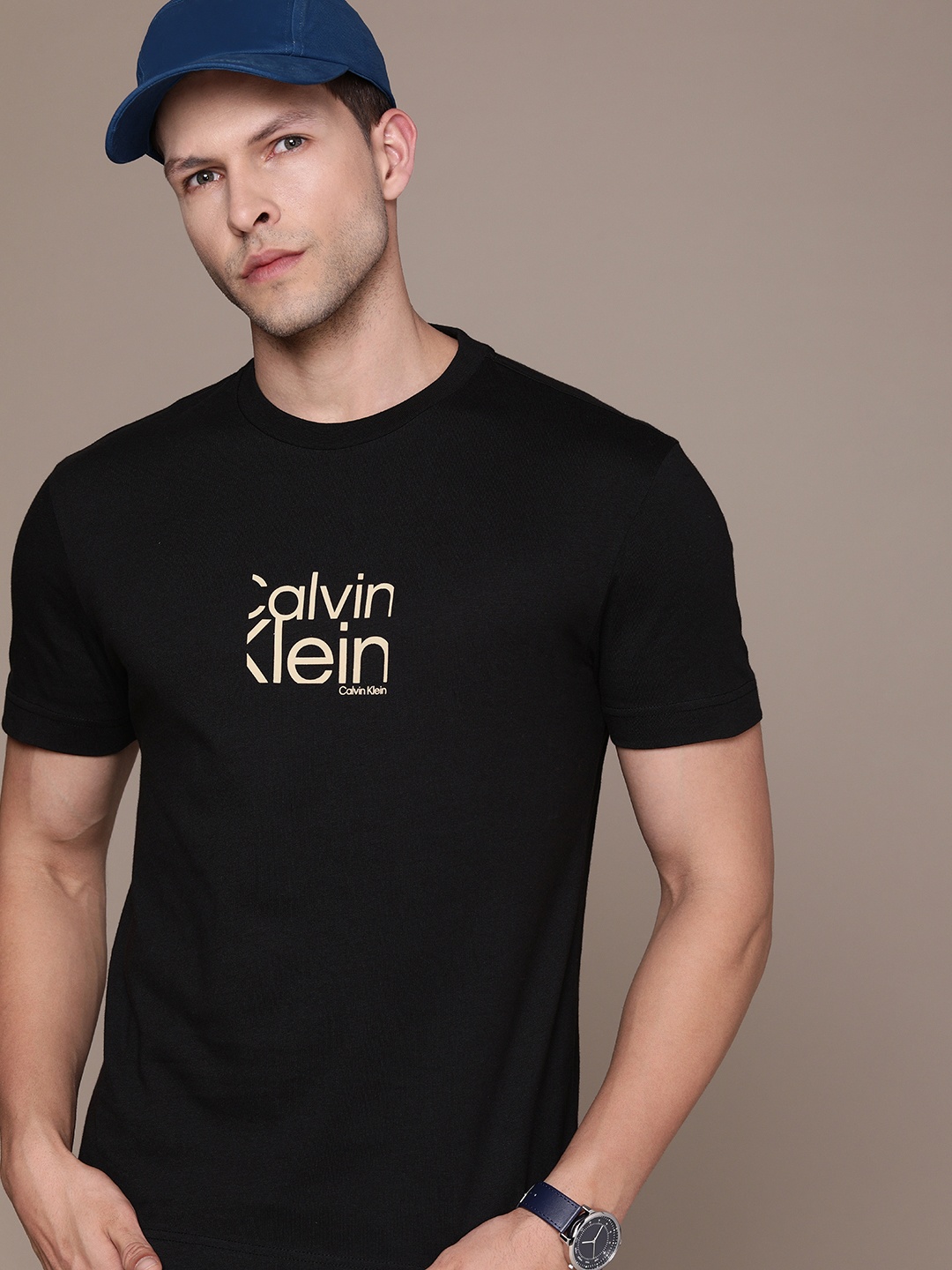 

Calvin Klein Jeans Men Pure Cotton Brand Logo Printed T-shirt, Black