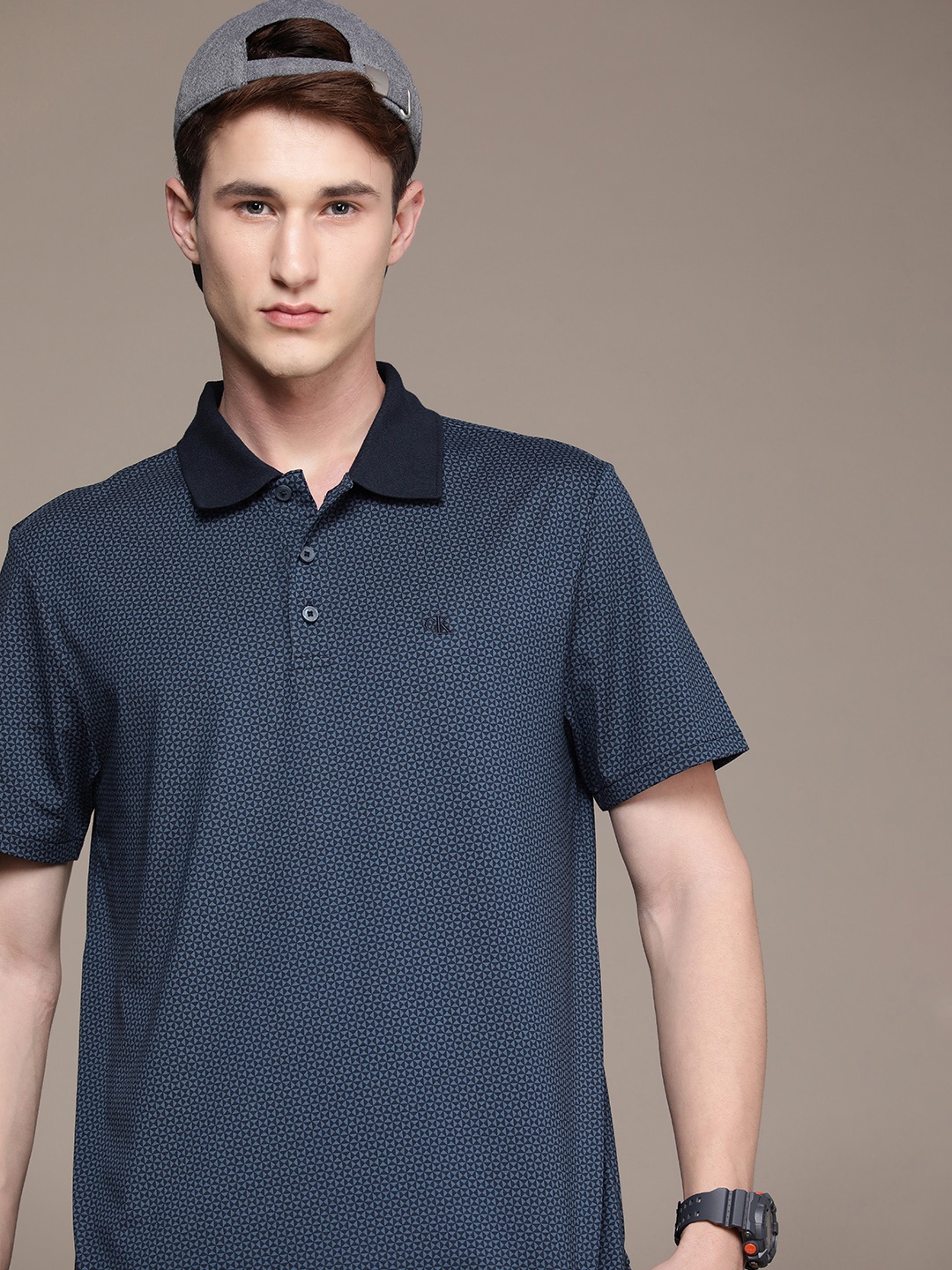 

Calvin Klein Jeans Men Geometric Printed Polo Collar T-shirt, Blue