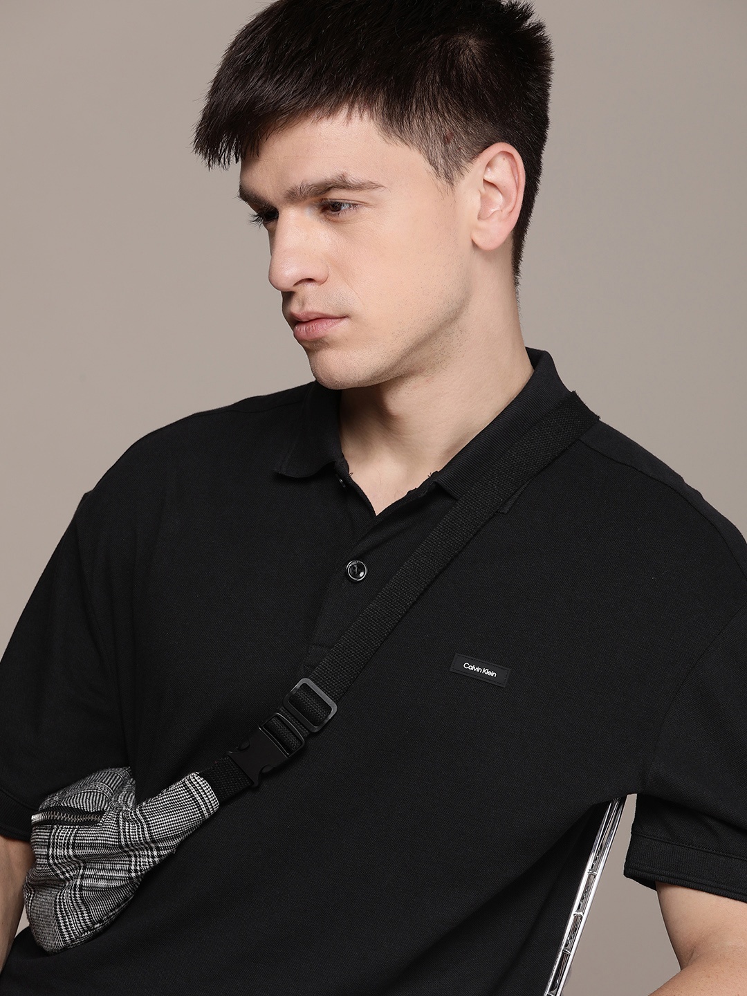 

Calvin Klein Jeans Men Applique Brand Logo Polo Collar T-shirt, Black