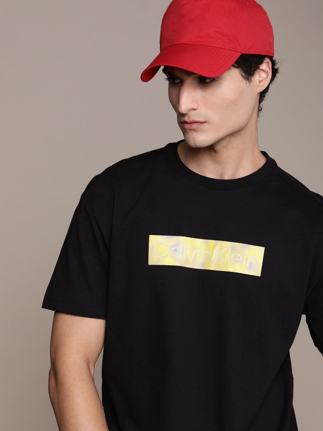 

Calvin Klein Jeans Men Pure Cotton Brand Logo Printed T-shirt, Black