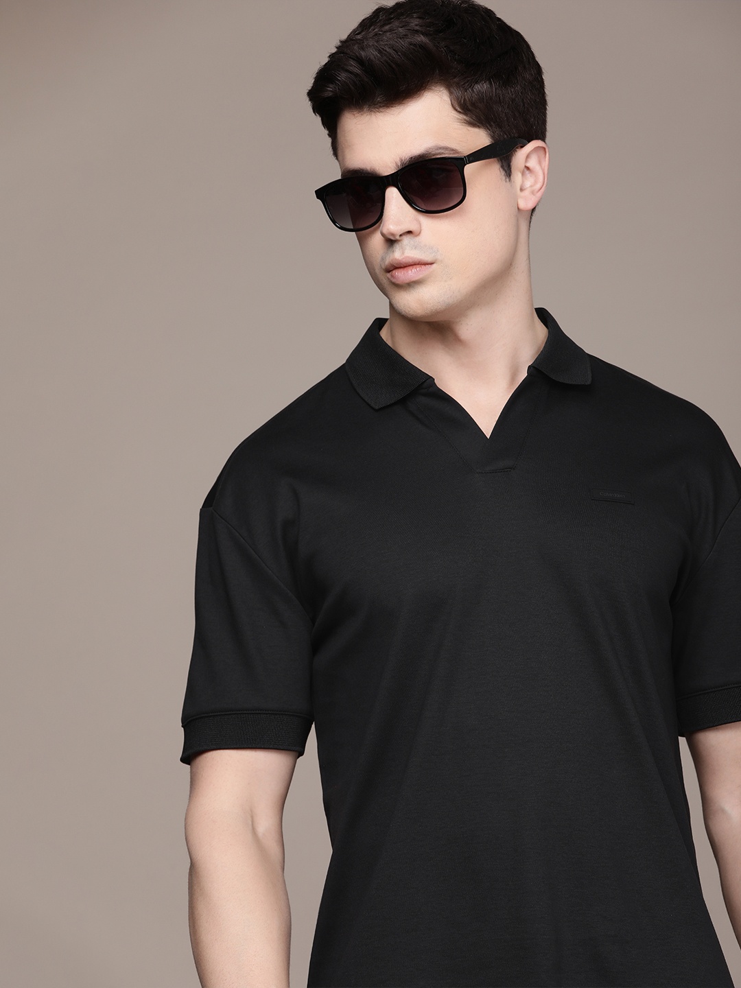 

Calvin Klein Jeans Polo Collar Pure Cotton T-shirt With Applique Detail, Black