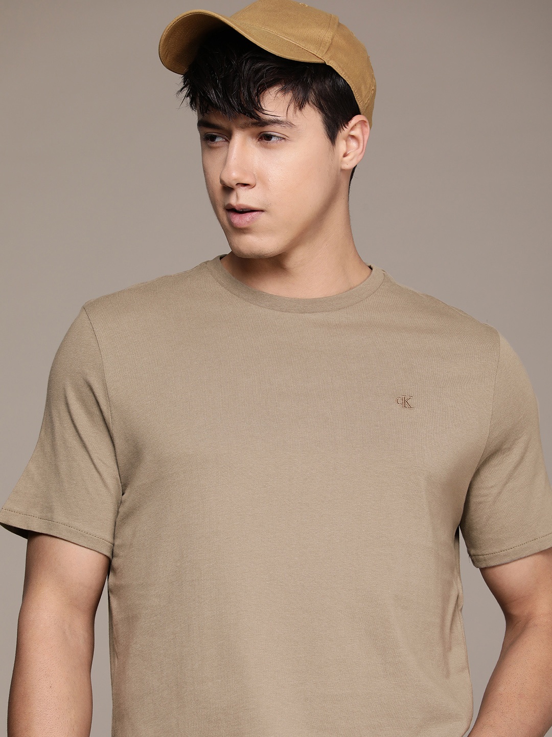 

Calvin Klein Jeans Men Pure Cotton Round Neck T-shirt, Brown