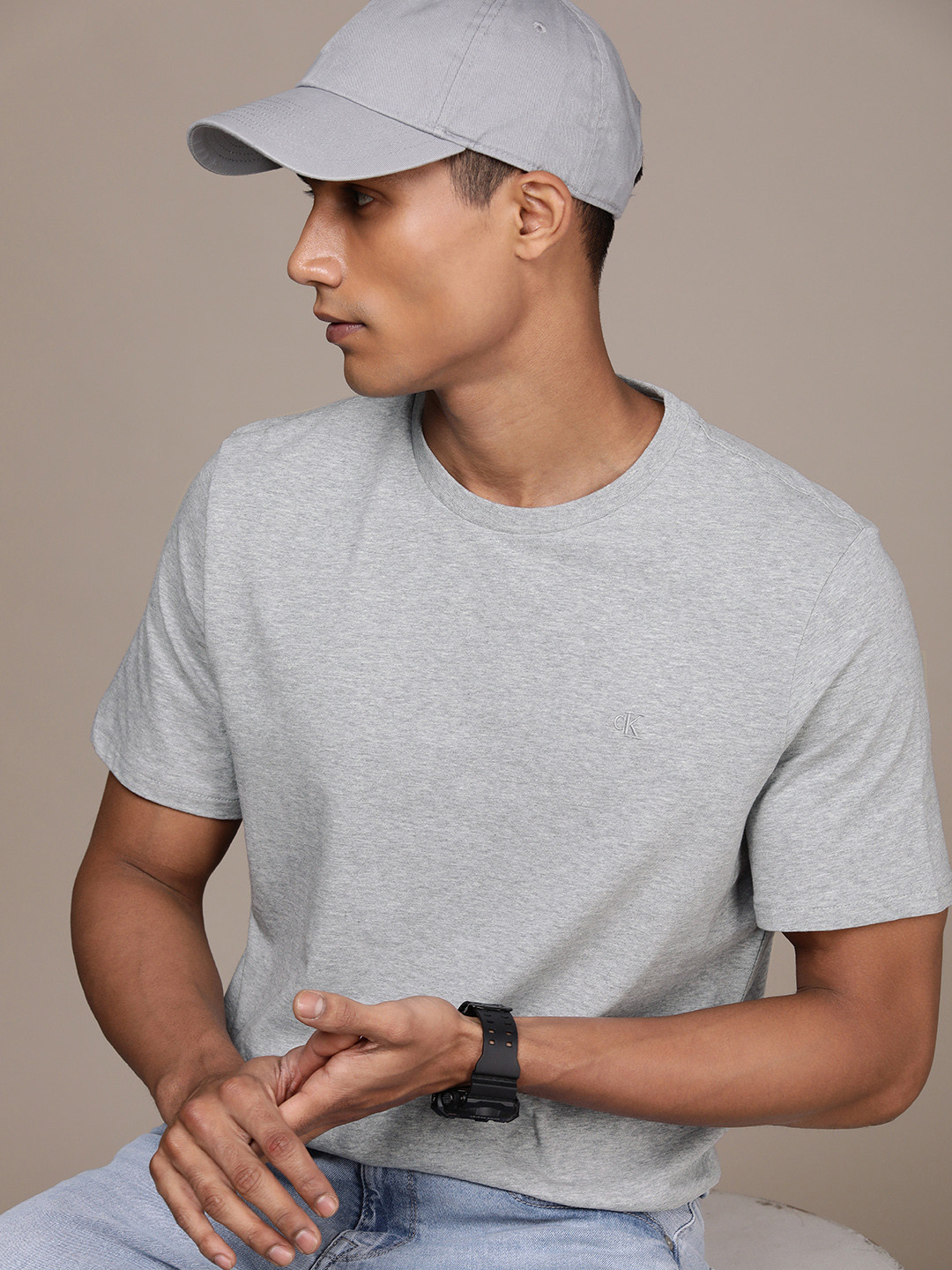 

Calvin Klein Jeans Men Solid Pure Cotton T-shirt, Grey