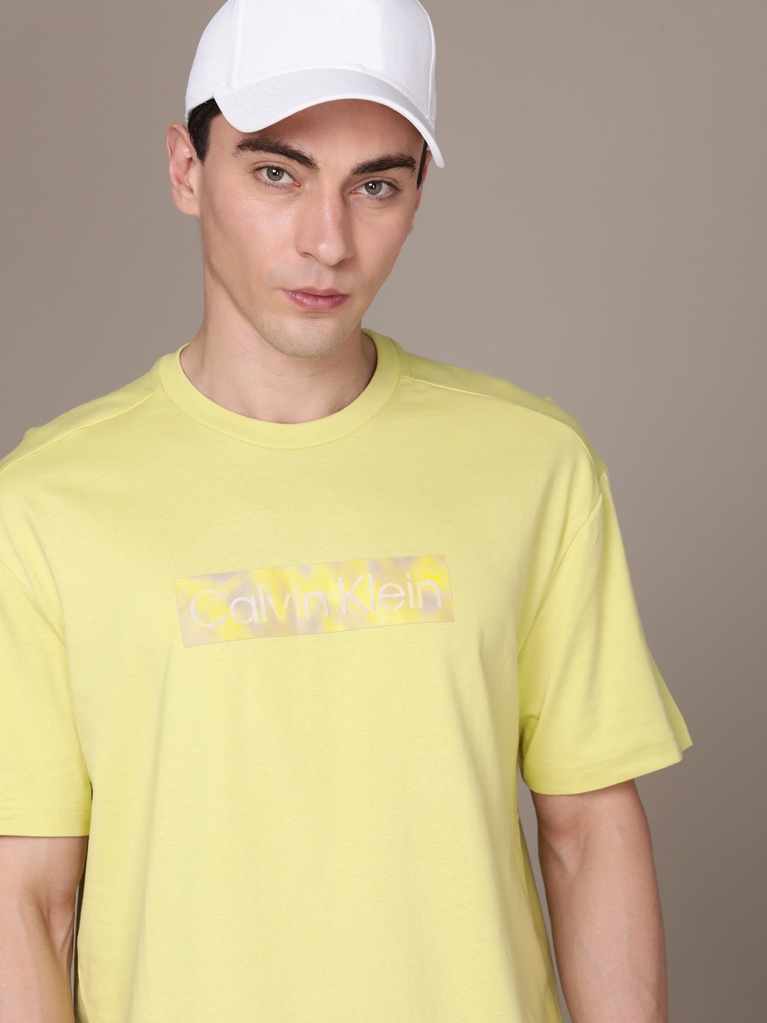 

Calvin Klein Jeans Men Brand Logo Printed Pure Cotton T-shirt, Yellow