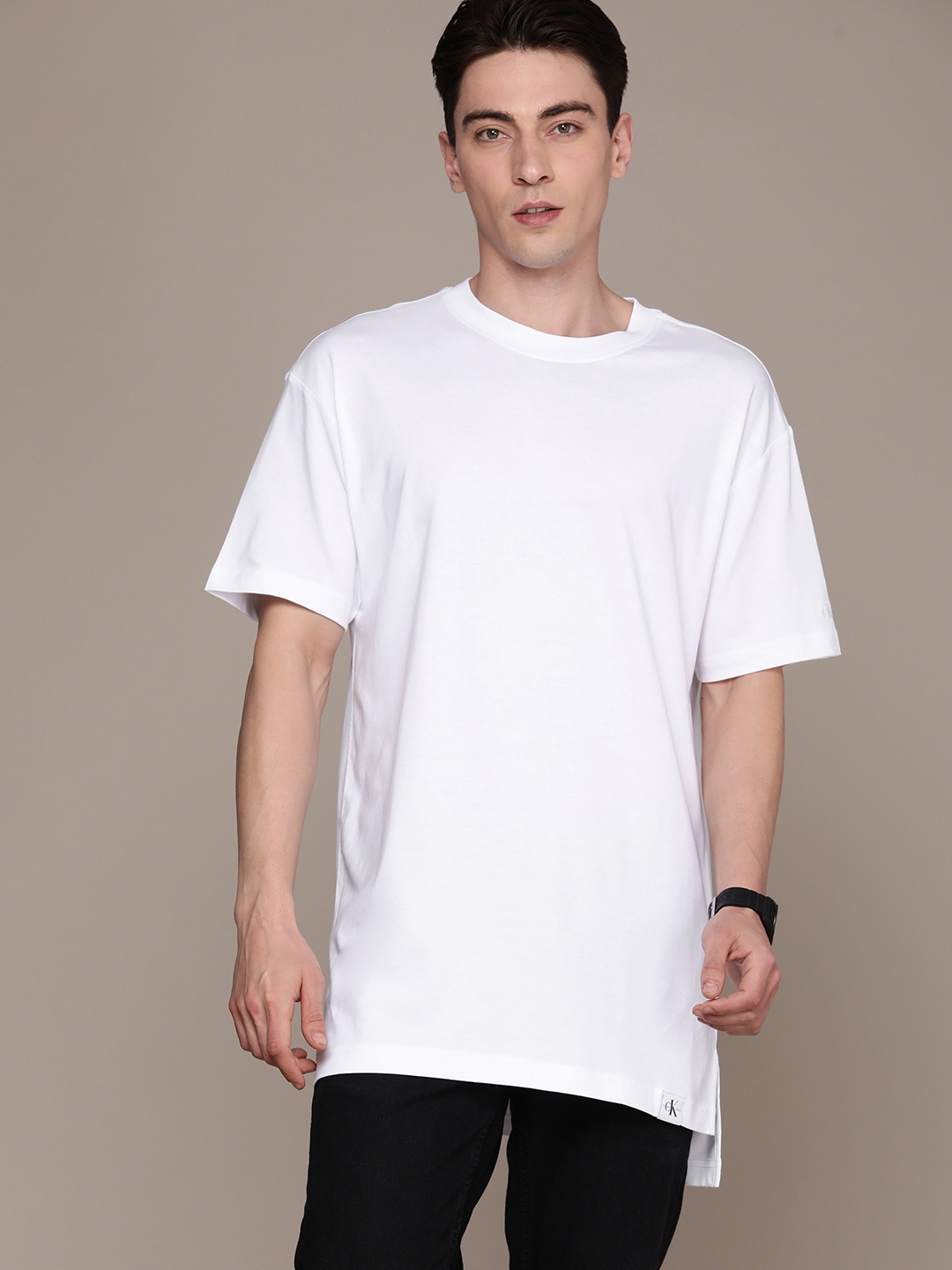 

Calvin Klein Jeans Men Drop-Shoulder Sleeves Round Neck Longline T-shirt, White
