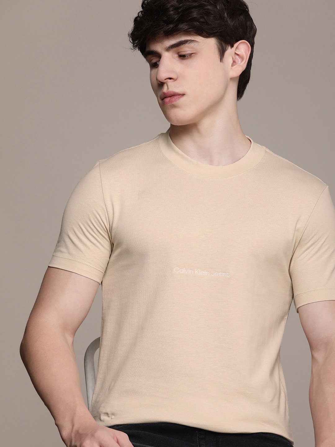 

Calvin Klein Jeans Men Solid Pure Cotton T-shirt With Brand Logo Embroidered Detail, Beige