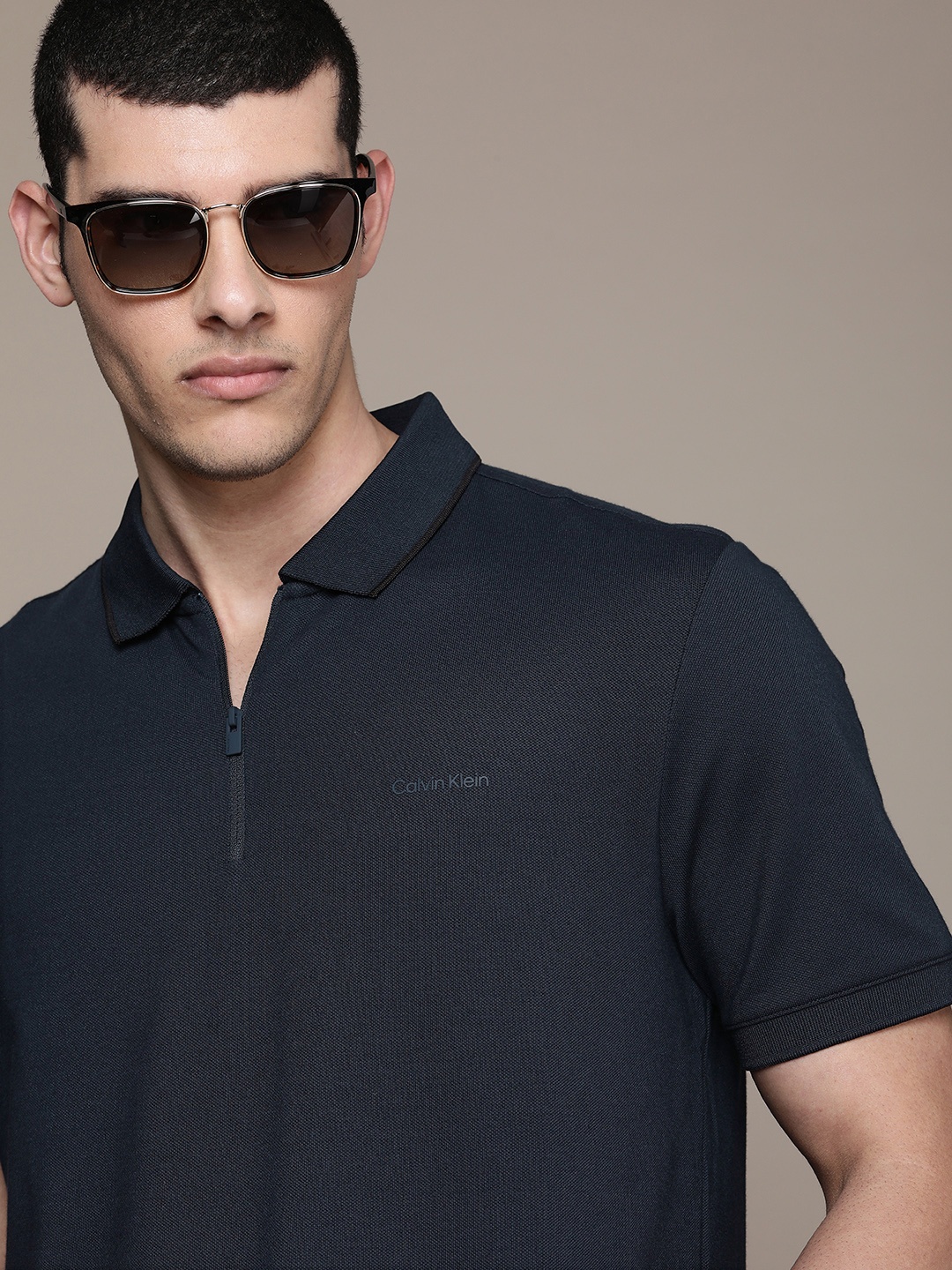 

Calvin Klein Jeans Men Solid Polo Collar T-shirt, Navy blue