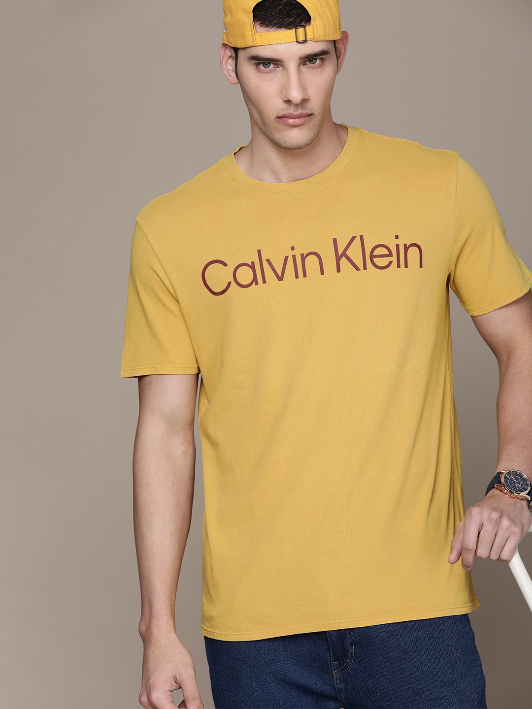 

Calvin Klein Jeans Men Pure Cotton Brand Logo Printed T-shirt, Yellow