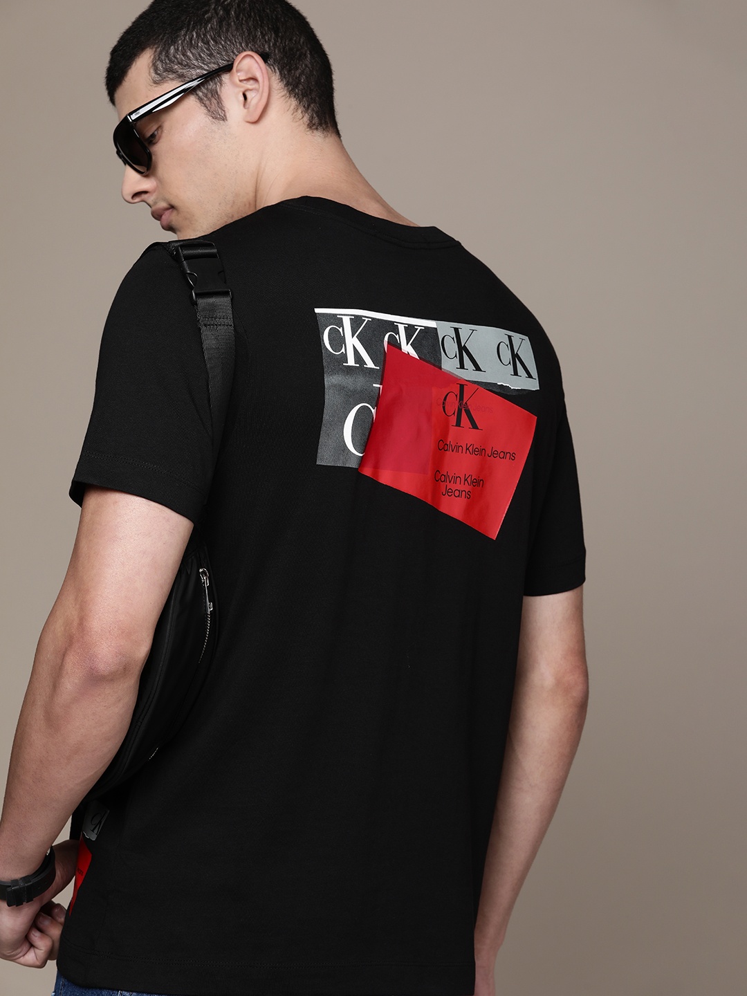 

Calvin Klein Jeans Men Brand Logo Printed Pure Cotton T-shirt, Black