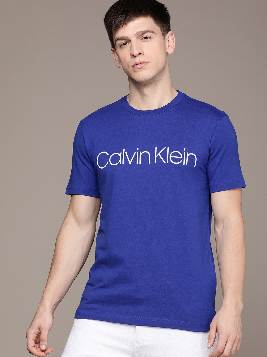 

Calvin Klein Jeans Men Brand Logo Printed Pure Cotton T-shirt, Blue