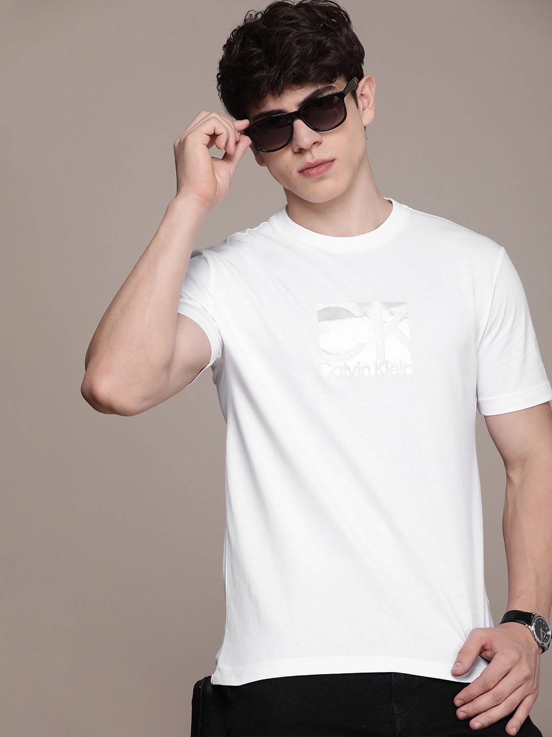 

Calvin Klein Jeans Round Neck Typography Printed Pure Cotton T-shirt, White
