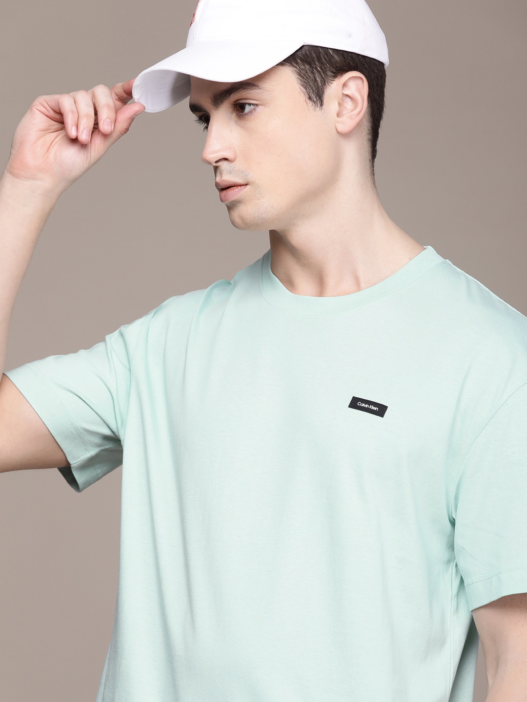

Calvin Klein Jeans Round Neck Pure Cotton T-shirt With Applique Detail, Turquoise blue