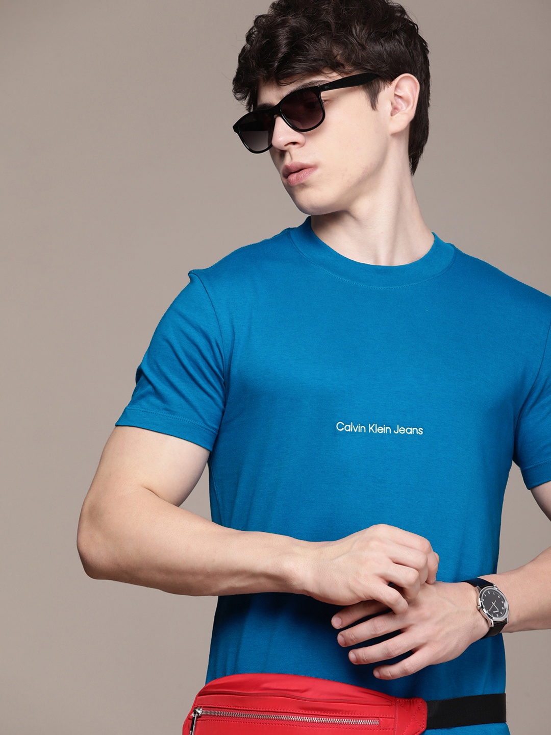 

Calvin Klein Jeans Men Solid Pure Cotton T-shirt With Brand Logo Embroidered Detail, Blue