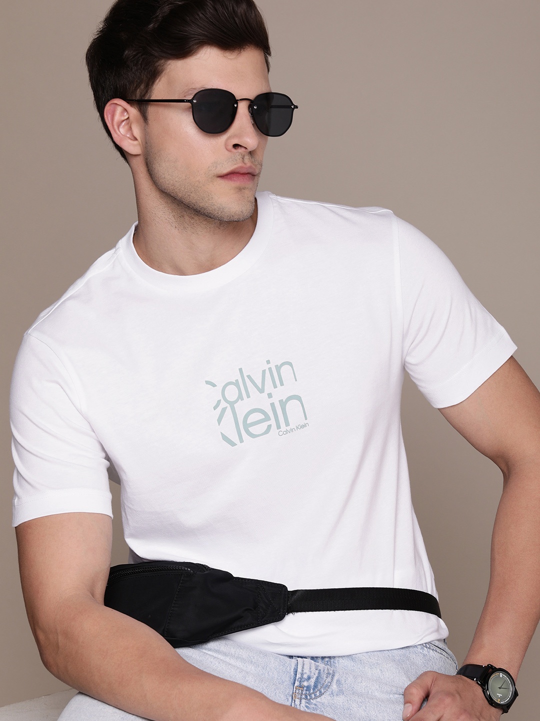 

Calvin Klein Jeans Men Pure Cotton Brand Logo Printed T-shirt, White