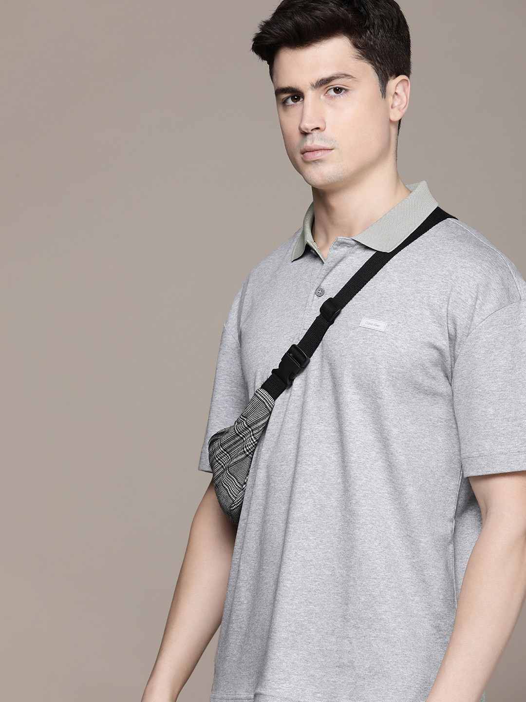 

Calvin Klein Jeans Solid Polo Collar Drop-Shoulder Sleeves Comfort Fit Pure Cotton T-shirt, Grey melange