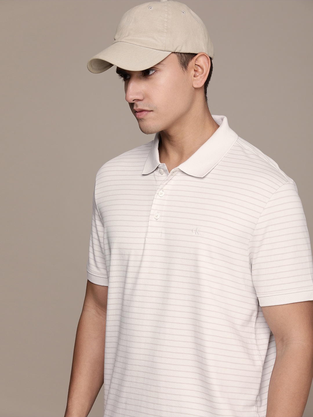 

Calvin Klein Jeans Men Striped Polo Collar T-shirt, Grey