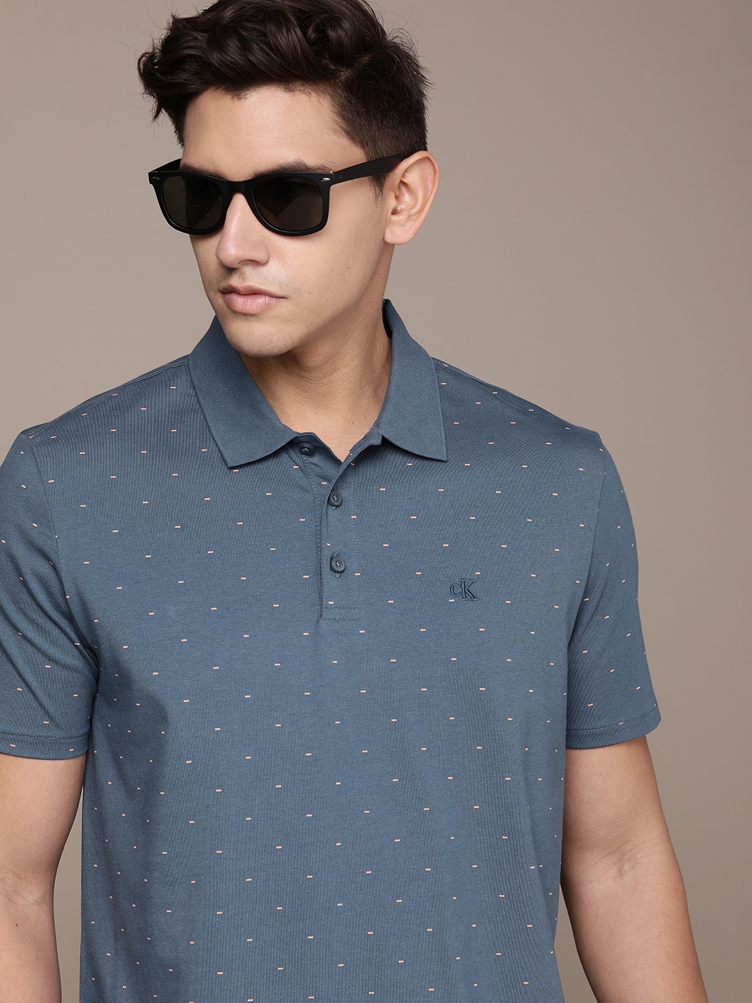 

Calvin Klein Jeans Men Geometric Printed Polo Collar T-shirt, Blue