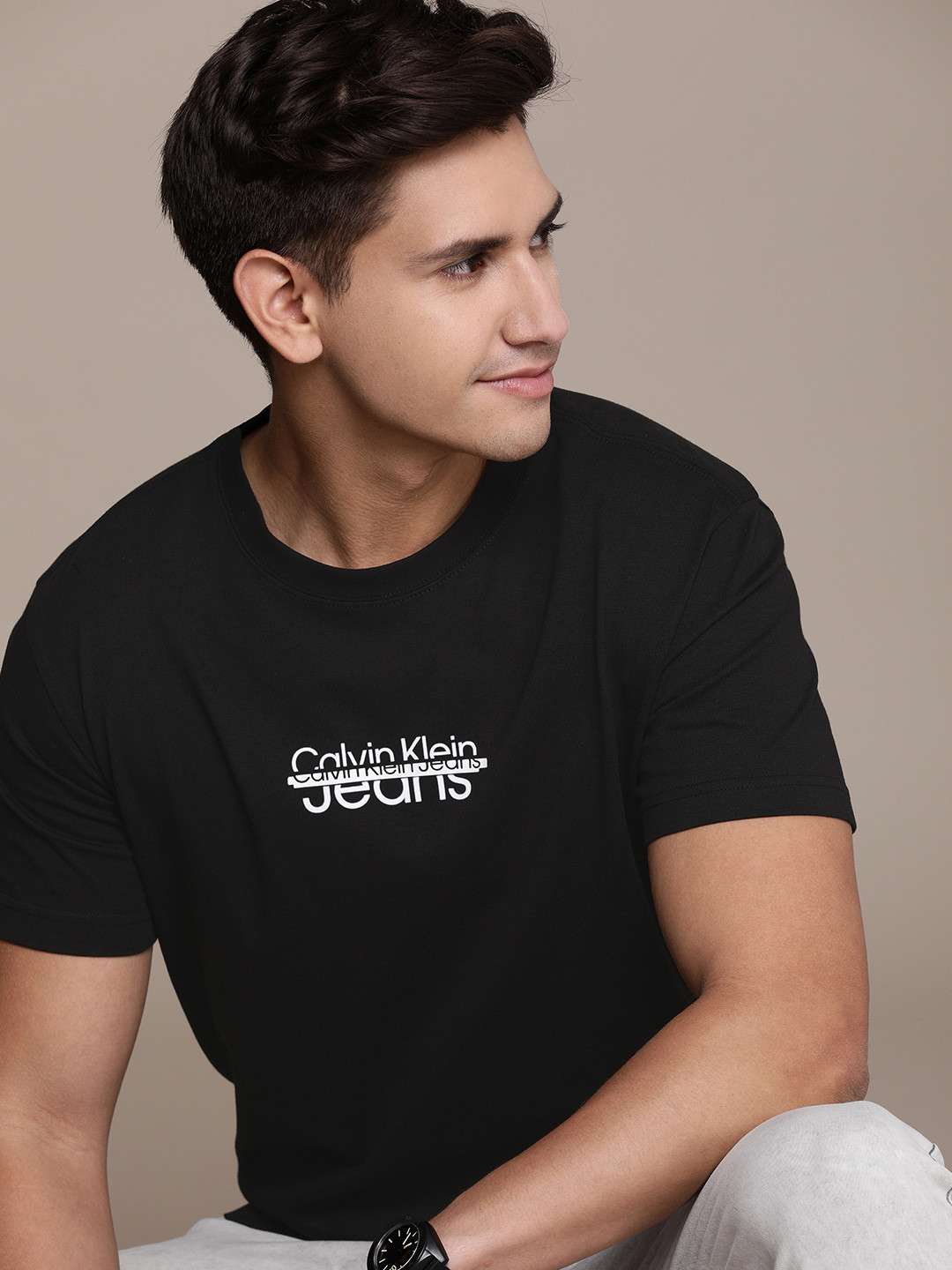 

Calvin Klein Jeans Men Brand Logo Printed Pure Cotton T-shirt, Black