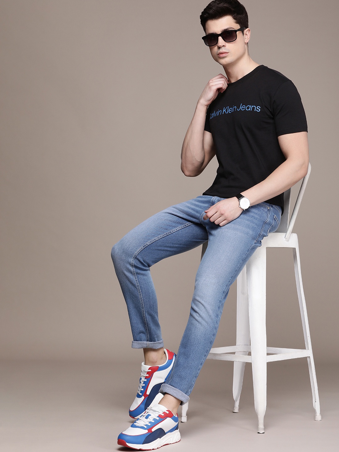 

Calvin Klein Jeans Men Pure Cotton Brand Logo Printed T-shirt, Black