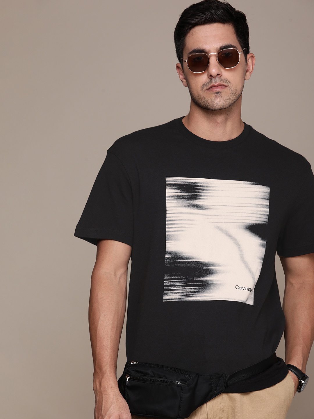 

Calvin Klein Jeans Men Pure Cotton Graphic Printed T-shirt, Black