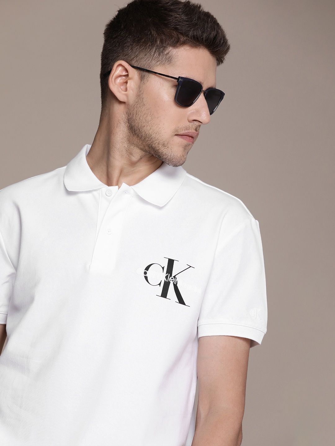 

Calvin Klein Jeans Men Brand Logo Printed Polo Collar T-shirt, White
