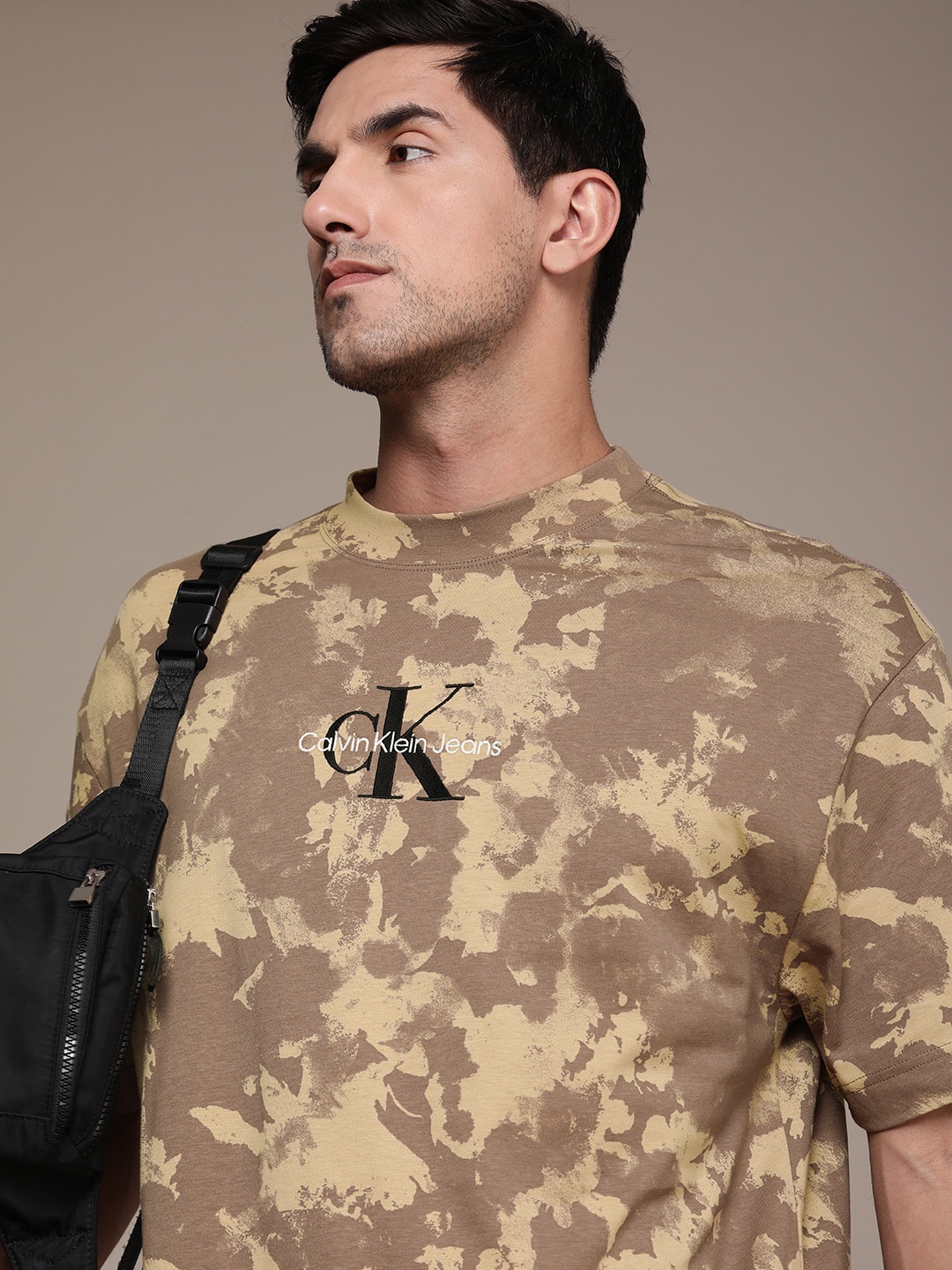 

Calvin Klein Jeans Men Pure Cotton Camouflage Printed Drop-Shoulder T-shirt, Beige