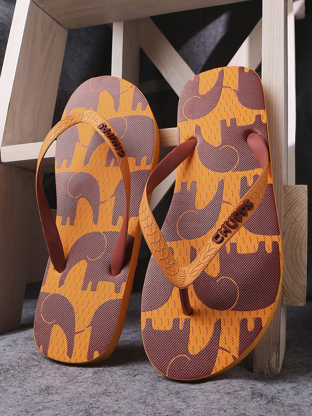

CHUPPS Women Orange & Brown Printed Rubber Thong Flip-Flops