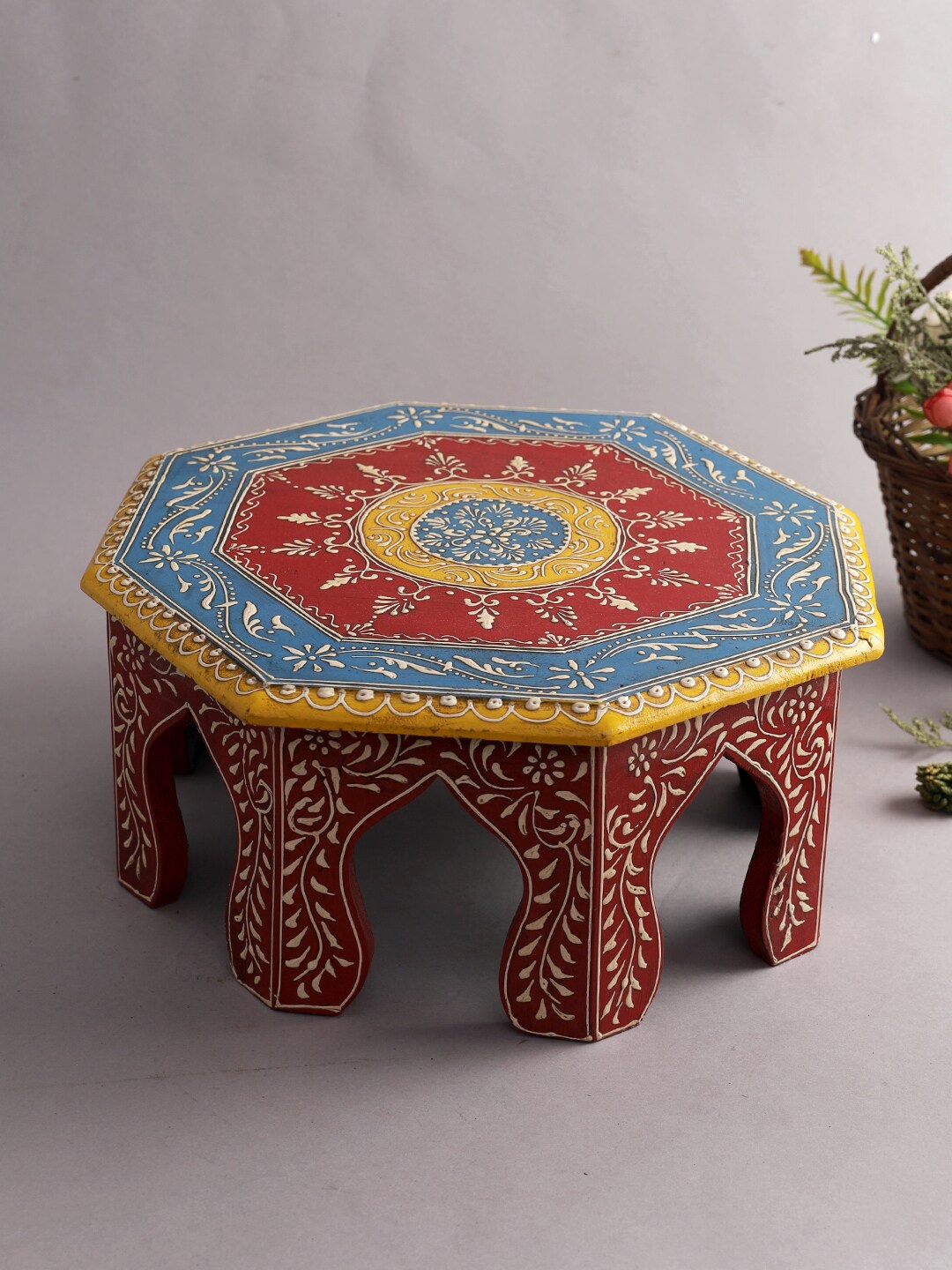 

Aapno Rajasthan Red & Blue Ethnic Motifs Textured Round Shape Wooden Chowkie