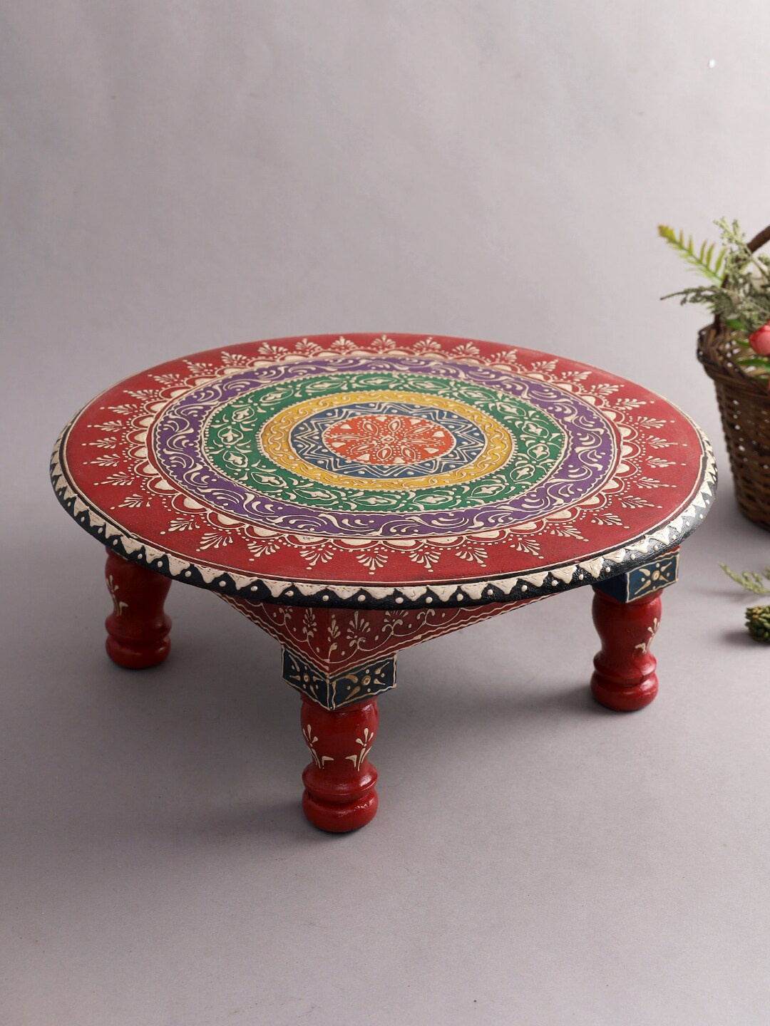 

Aapno Rajasthan Red & Yellow Ethnic Motifs Textured Wooden Chowkie