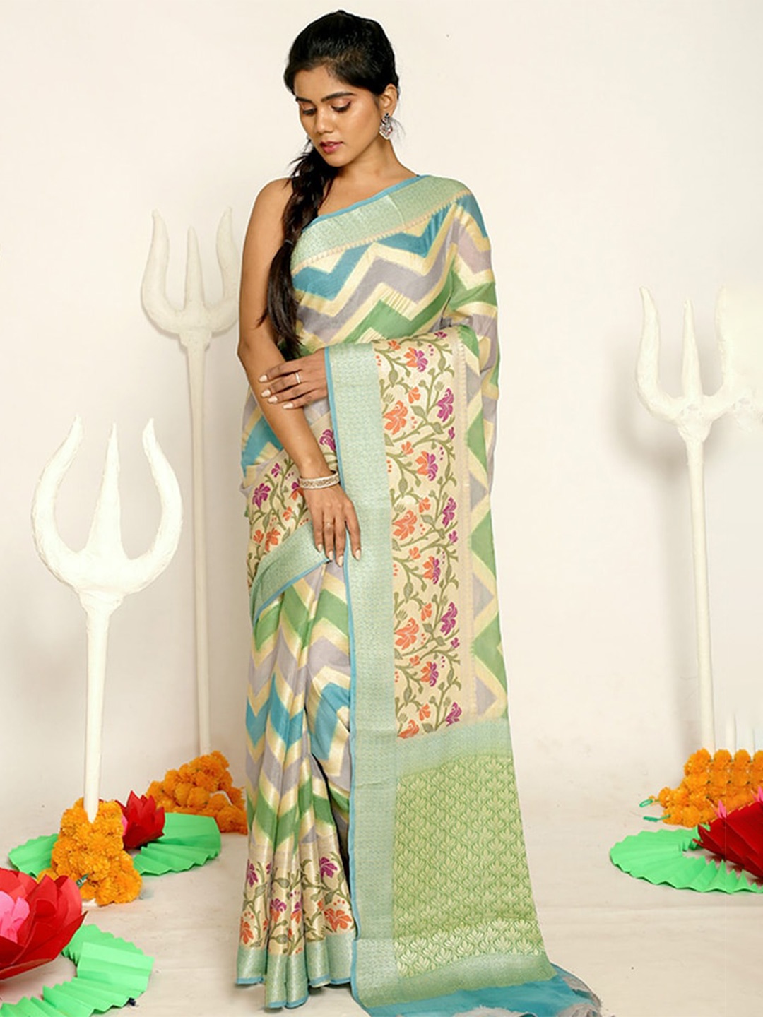 

AllSilks Green & Grey Woven Design Zari Pure Georgette Saree