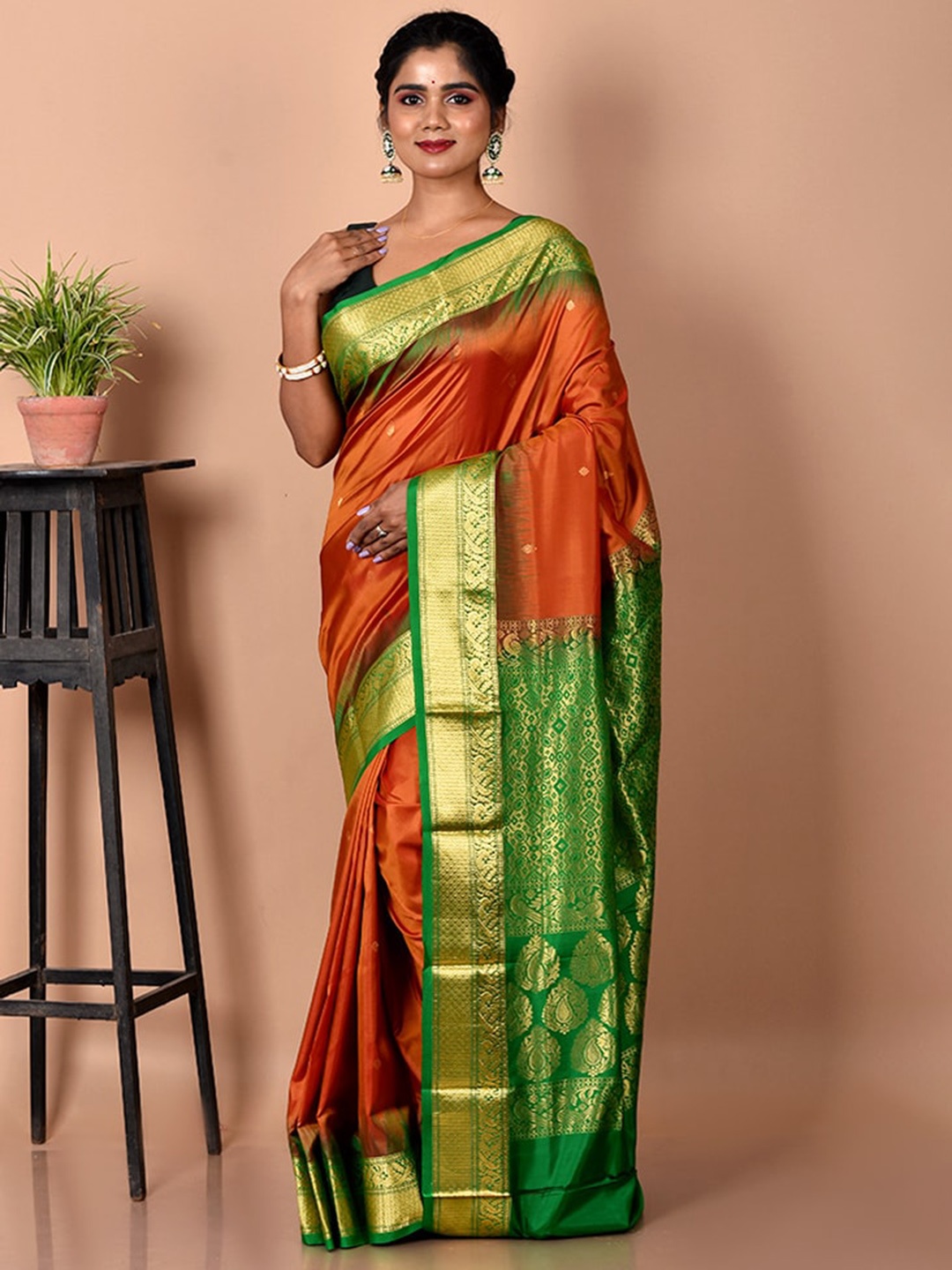 

AllSilks Rust & Green Woven Design Zari Pure Silk Kanjeevaram Saree