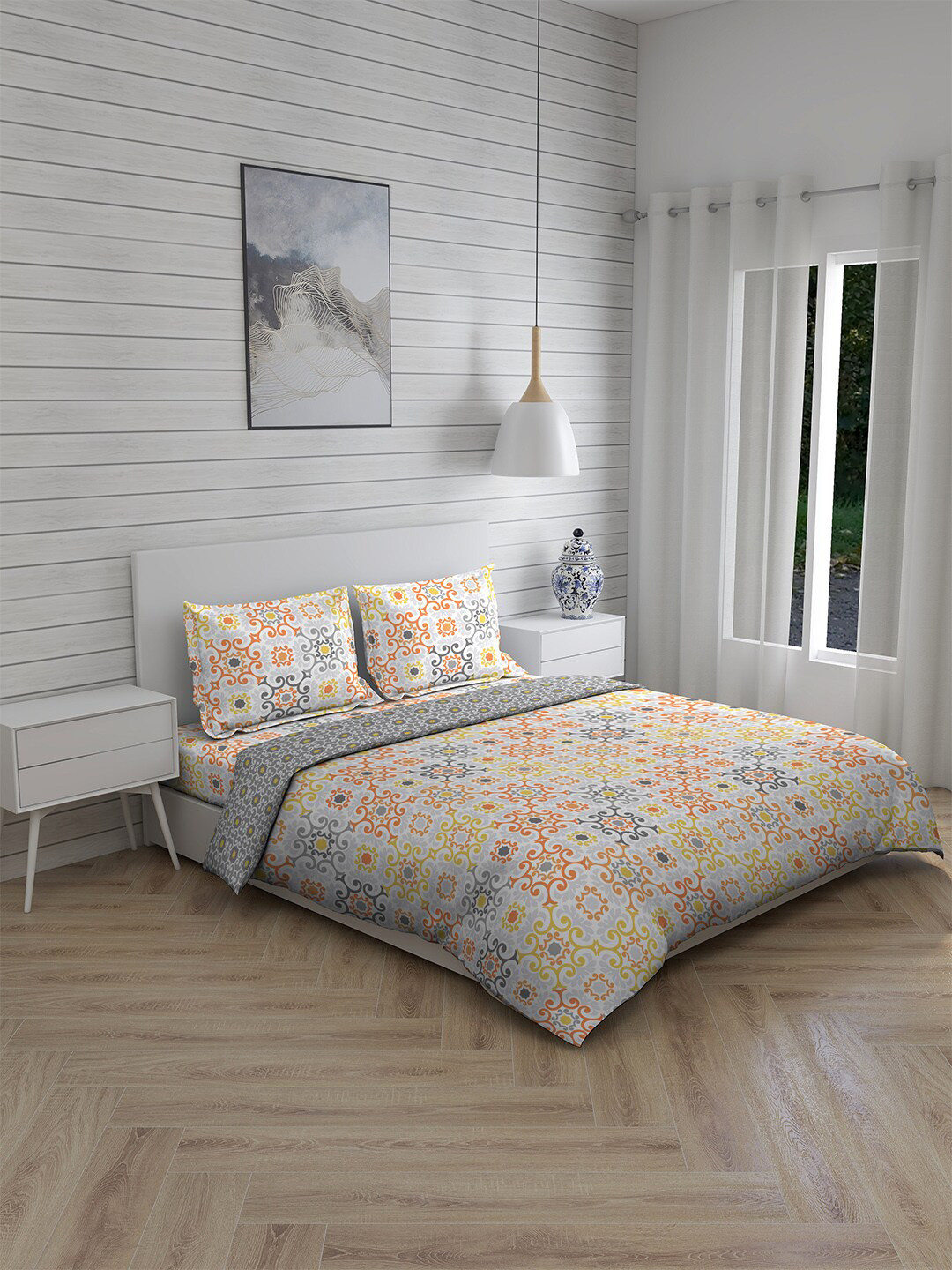 

Layers Yellow & Orange Printed Cotton Double Queen Bedding Set