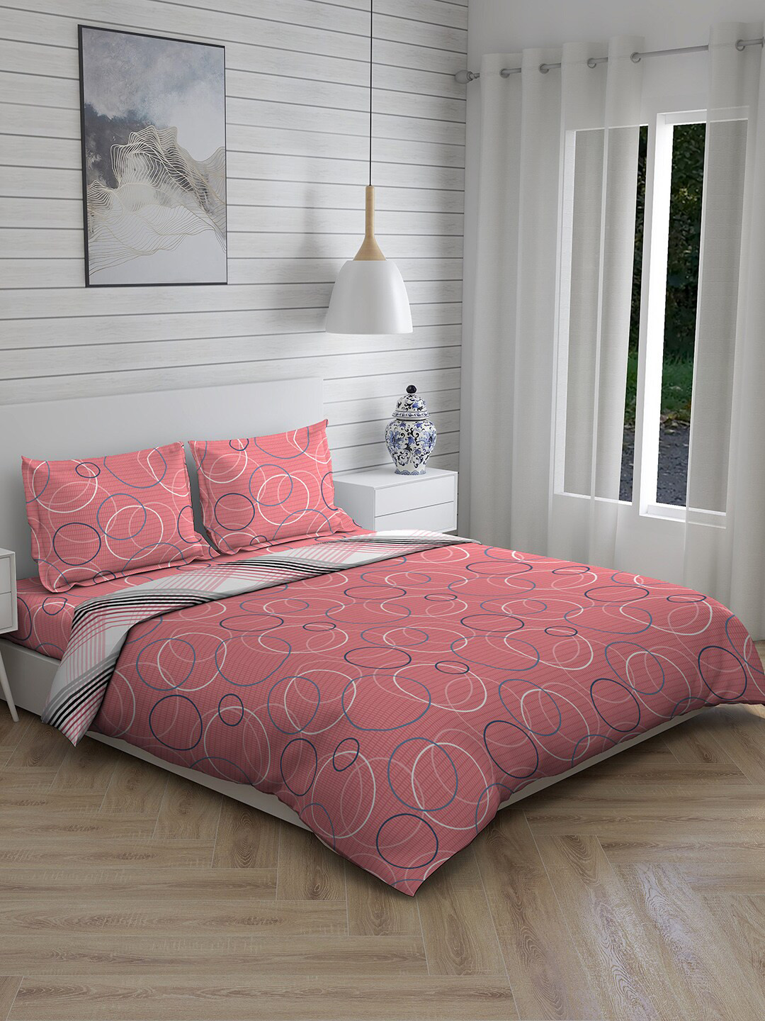 

Layers Pink Printed Cotton Double Queen Bedding Set