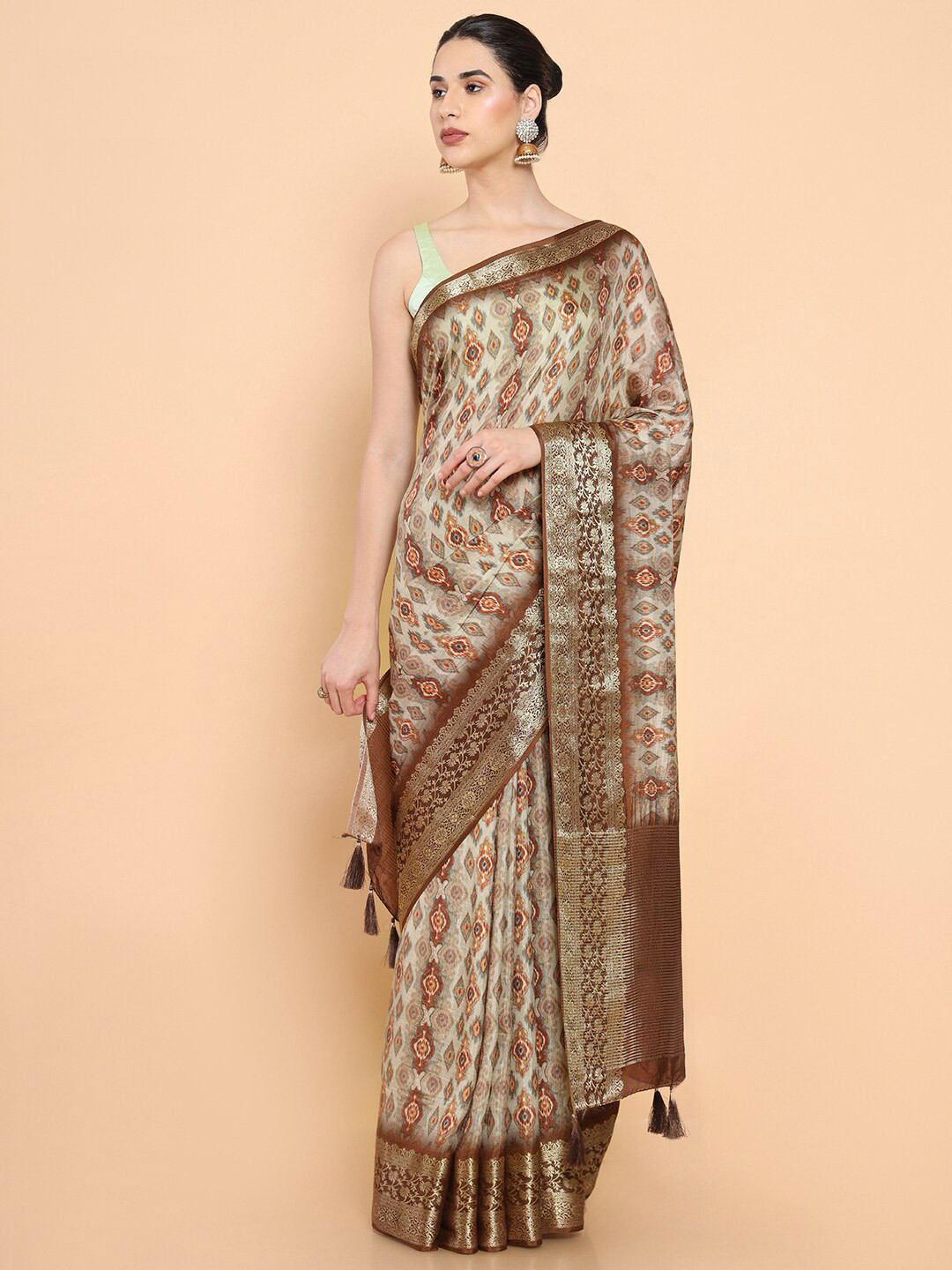 

Soch Brown & White Ethnic Motifs Zari Pure Silk Saree